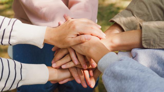 Hands together in a circle