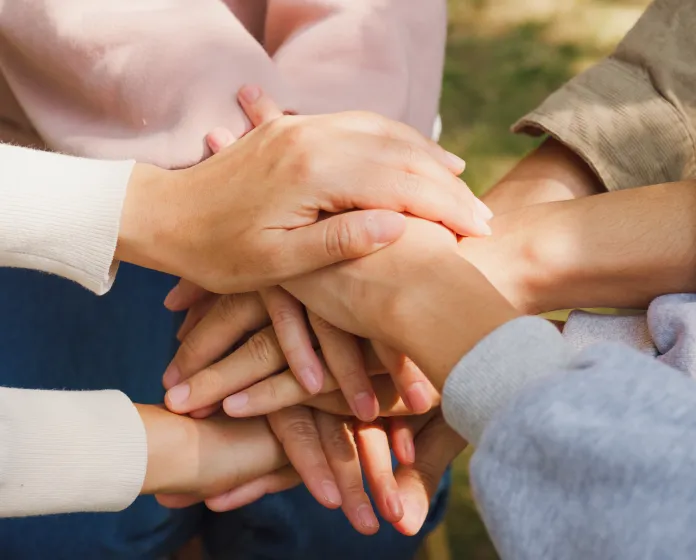 Hands together in a circle